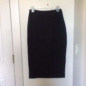 Black skirt with a gold zipper